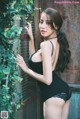 Beautiful Pichana Yoosuk shows off her figure in a black swimsuit (19 photos) P14 No.0a0589