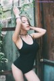 Beautiful Pichana Yoosuk shows off her figure in a black swimsuit (19 photos) P12 No.90a5d8